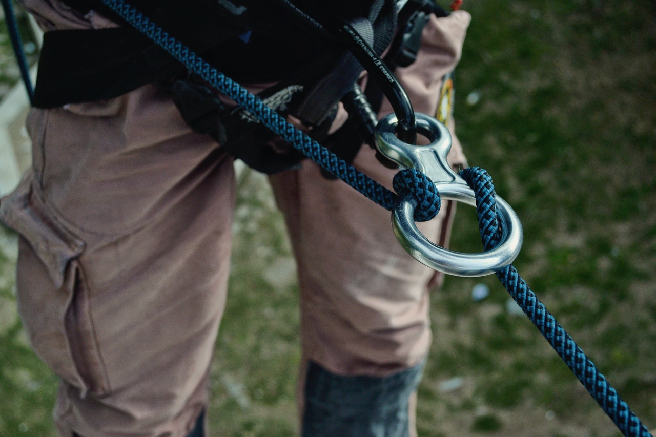 men performing Abseiling